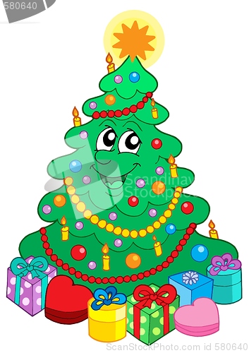 Image of Smiling cute Christmas tree with gift