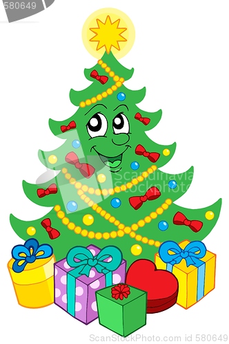 Image of Smiling Christmas tree with gifts