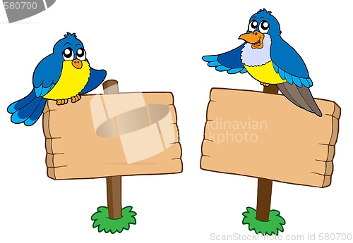 Image of Two wooden signs with birds