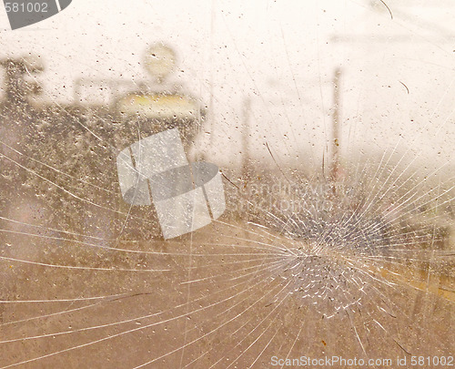 Image of Cracked glass on a train platform