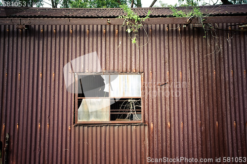 Image of old rusty tin shed