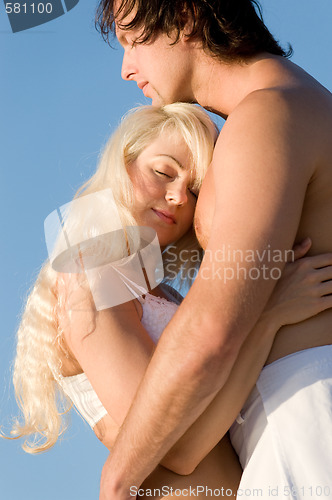 Image of Happy couple on the beach