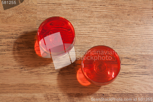 Image of Two glasses with jelly, oak floor two