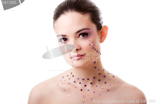 Image of Beautiful woman with purple makeup