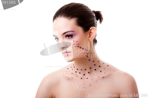 Image of Beautiful woman with purple makeup
