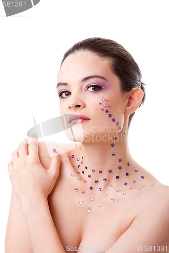 Image of Beautiful woman with purple makeup