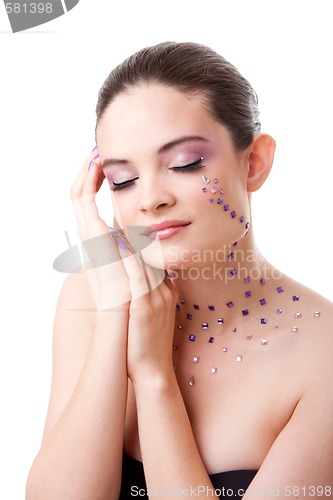Image of Beatiful woman with purple makeup