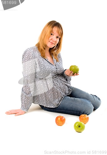 Image of pregnant woman with apples