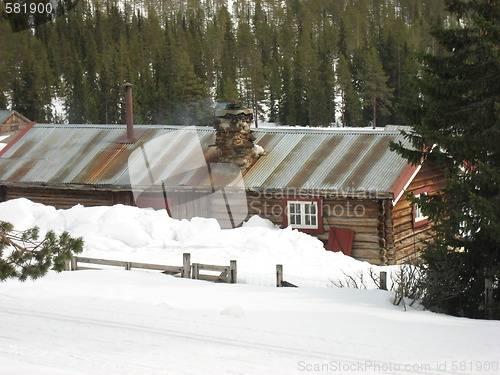 Image of Old farmhouse in the snow