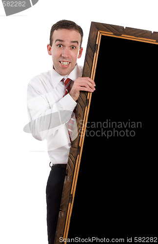 Image of Businessman Holding Large Frame
