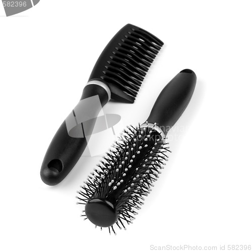 Image of two hairbrushes