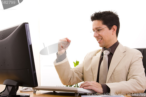 Image of businessman showing his success