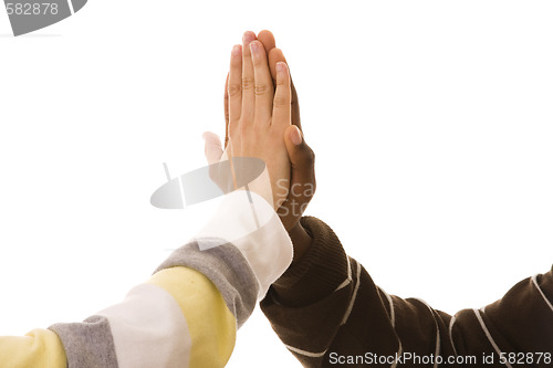 Image of multiracial hands clapping
