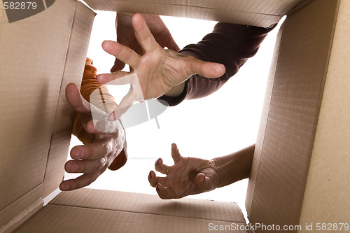 Image of three hands trying to reach the content 