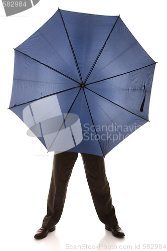 Image of hiding bewind an umbrella