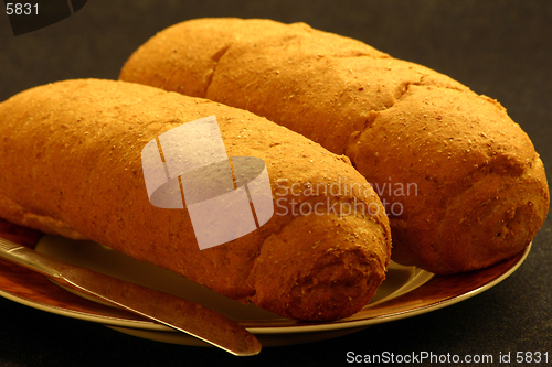 Image of Bread rolls on a plate. Shallow DOF.