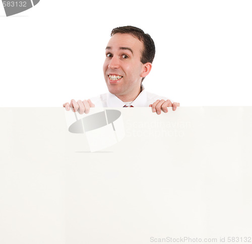 Image of Man Looking Over Wall