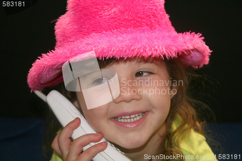 Image of Pretty girl in pink hat