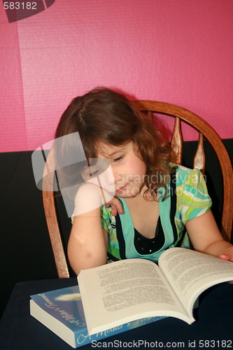 Image of Little girl reading