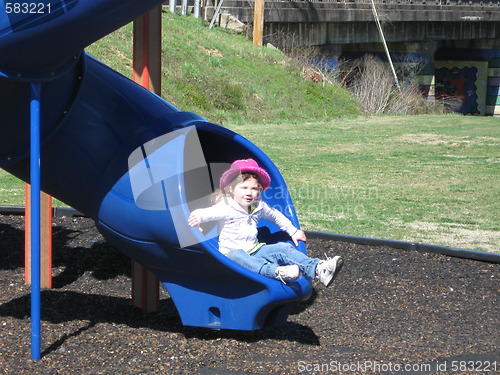 Image of Little girl on slide