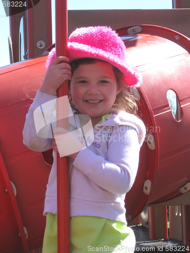 Image of Cute girl on the park playground