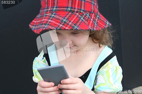 Image of Little girl with calculator