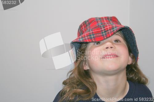 Image of Pretty little girl in red hat