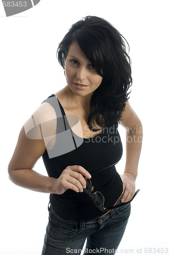 Image of shapely pretty young woman smiling with attitude
