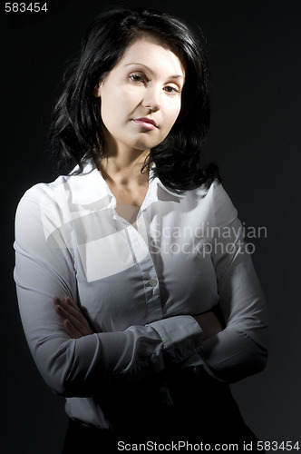 Image of shapely pretty young woman smiling with attitude