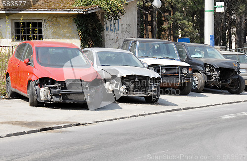 Image of Crashed cars parked