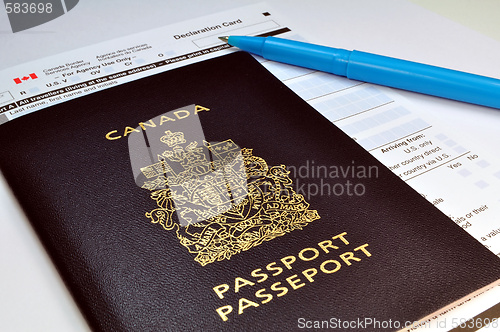 Image of Canadian passport and Customs declaration form