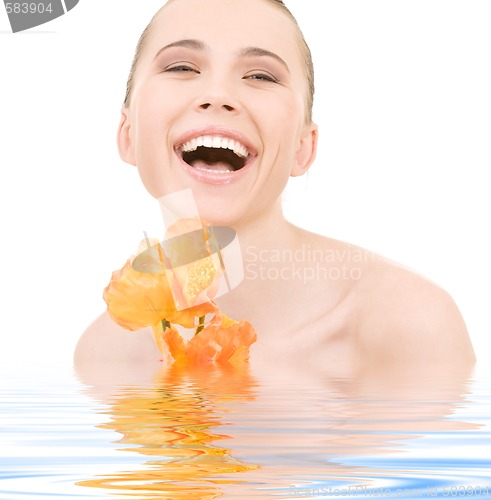 Image of laughing woman with flowers