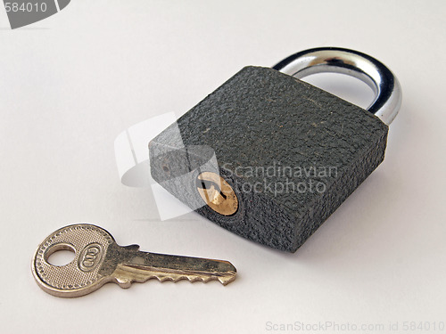 Image of Padlock and key.      