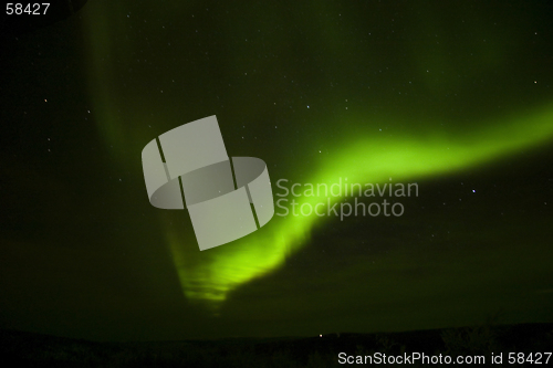 Image of Bright aurora arc and a cloud