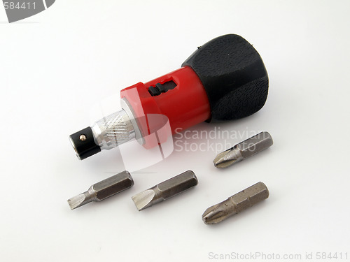 Image of Ratchet screw  driver and spare bits. 