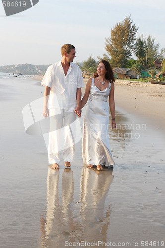 Image of Couple on the beach.