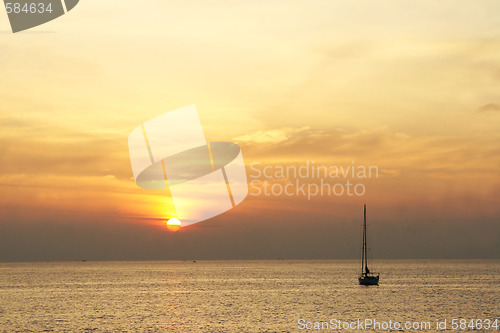 Image of Yacht at sunset.