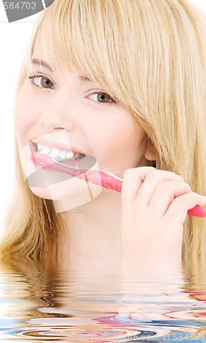 Image of happy girl with toothbrush