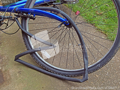 Image of Mending a puncture on a mountain bike.