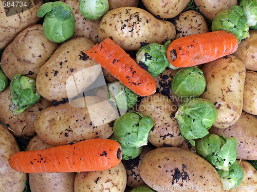 Image of Potatoes, carrots and brussel sprouts.   