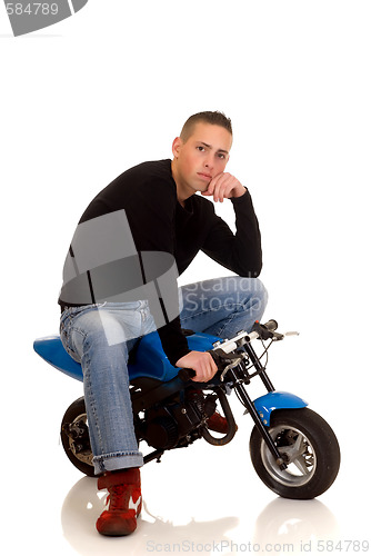 Image of Youngster with his pocketbike