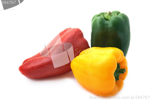 Image of  red green and yellow sweet pepper on a white background