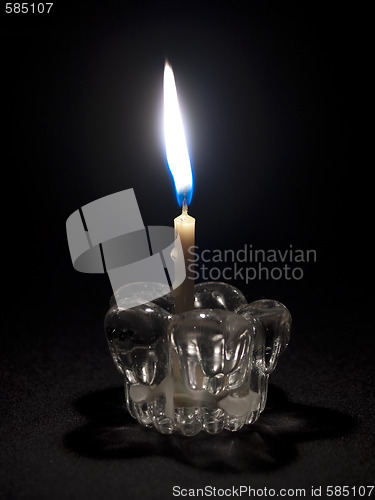 Image of Candle in darkness