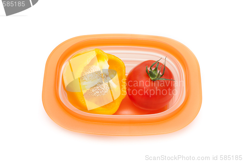 Image of Cut wanted pepper and red tomato