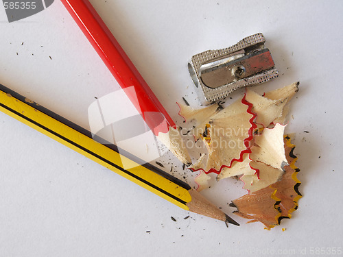 Image of Pencils and a sharpener. 