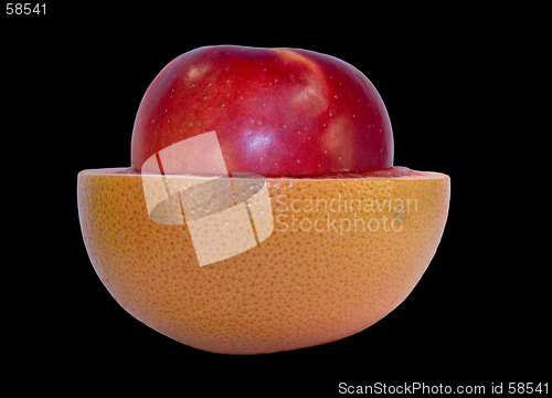 Image of Grapefruit and apple isolated on black background with clipping