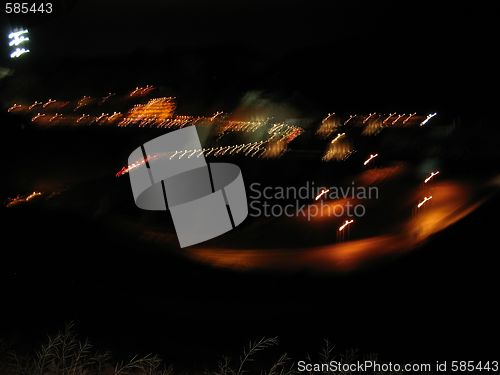 Image of Light Patterns Beyond the Grass