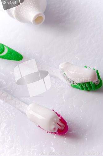 Image of toothpaste and toothbrushes