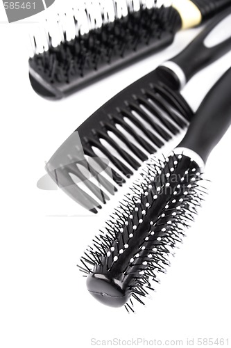 Image of three hairbrushes