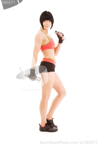Image of muscular fitness instructor with dumbbells